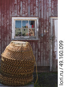 Crab pots stacked at fishing shed, Victoria, Prince Edward Island, Canada. Стоковое фото, агентство Ingram Publishing / Фотобанк Лори