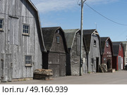 Fishing sheds at harbor, Lot 18, Prince County, Prince Edward Island, Canada. Стоковое фото, агентство Ingram Publishing / Фотобанк Лори