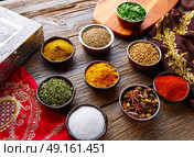 Indian cuisine spices mix as coriander curry  cardamom cumin. Стоковое фото, агентство Ingram Publishing / Фотобанк Лори
