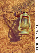 in the rock desert of jordan an antique old fashioned lamp isolated. Стоковое фото, агентство Ingram Publishing / Фотобанк Лори