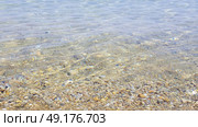 Sun reflection in shallow sea water, Skiathos island, Greece. Стоковое фото, агентство Ingram Publishing / Фотобанк Лори