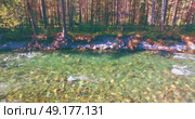 Low altitude flight over fresh fast mountain river with rocks at sunny summer morning. Стоковое видео, видеограф Александр Маркин / Фотобанк Лори