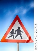 crosswalk sign  simbol isolated  in the sky warning concept. Стоковое фото, агентство Ingram Publishing / Фотобанк Лори