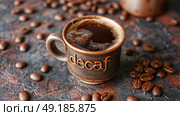 decaf mug of coffee in outdoor fall coffee shop. Стоковое AI-изображение, AI-художник Anastasy Yarmolovich / Фотобанк Лори