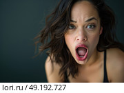 A woman with a shocked and astonished facial expression. Стоковое AI-изображение, AI-художник Данила Большаков / Фотобанк Лори