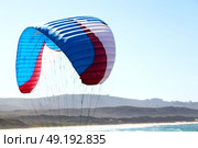 kite surfing colors in the sky background. Стоковое фото, агентство Ingram Publishing / Фотобанк Лори