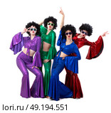 Disco style girls in colorful flared suits and African American wigs on a white background. Seventies or eighties style. Стоковое фото, фотограф Лазаренко Светлана / Фотобанк Лори