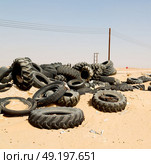 in oman old tires and desert  rubbish dump. Стоковое фото, агентство Ingram Publishing / Фотобанк Лори