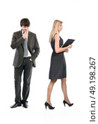 Business concept - young businesspeople and harassment. Стоковое фото, агентство Ingram Publishing / Фотобанк Лори