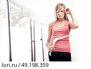 Empty wardrobe makes girl cry. Стоковое фото, агентство Ingram Publishing / Фотобанк Лори