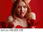 A woman in a vibrant red dress contorts her face comically, displaying a humorous expression. Стоковое AI-изображение, AI-художник Данила Большаков / Фотобанк Лори