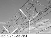 and cloudy sky in oman barbwire in the background . Стоковое фото, агентство Ingram Publishing / Фотобанк Лори