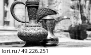 in the site of petra jordan the traditional coffe container isolated on a table. Стоковое фото, агентство Ingram Publishing / Фотобанк Лори