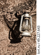 in the rock desert of jordan an antique old fashioned lamp isolated. Стоковое фото, агентство Ingram Publishing / Фотобанк Лори