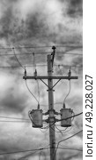 blur  in  philippines   a electric pole with transformer and wire  the cloudy sky. Стоковое фото, агентство Ingram Publishing / Фотобанк Лори