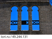 old window and wall in plaza de toros centre of colonia del sacramento uruguay. Стоковое фото, агентство Ingram Publishing / Фотобанк Лори