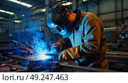 A welder at work in a welding shop. A working profession in a factory and production. The construction profession is a gas cutter or welder. Стоковое AI-изображение, AI-художник Антон Слабоспицкий / Фотобанк Лори