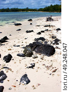 blue bay foam footstep indian ocean some stone in the island of deus cocos in mauritius . Стоковое фото, агентство Ingram Publishing / Фотобанк Лори