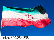 in iran blur  iranian waving flag  the blue sky and wind. Стоковое фото, агентство Ingram Publishing / Фотобанк Лори