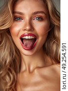 A blonde woman with a playful expression sticks out her tongue in a lighthearted moment. Стоковое AI-изображение, AI-художник Данила Большаков / Фотобанк Лори