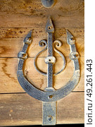 morocco knocker in africa the old wood  facade home and rusty safe padlock . Стоковое фото, агентство Ingram Publishing / Фотобанк Лори