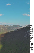 Rocky mountains and valley before sunset aerial. Стоковое видео, видеограф Михаил Коханчиков / Фотобанк Лори