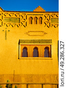 old brown construction in africa morocco and sky  near the tower. Стоковое фото, агентство Ingram Publishing / Фотобанк Лори