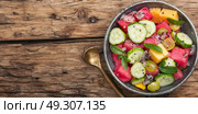 detox salad with watermelon. vegetarian fruity salad with watermelon,cucumber and grapes. Стоковое фото, агентство Ingram Publishing / Фотобанк Лори