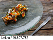 Smoked sardines salad with creamy cheese corn codium and hazelnuts. Стоковое фото, агентство Ingram Publishing / Фотобанк Лори