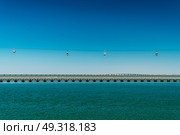 Aerial Cable Cars And Vasco da Gama Bridge In Lisbon, Portugal. Стоковое фото, агентство Ingram Publishing / Фотобанк Лори