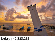 Puerto Morelos sunrise lighthouse in Mayan Riviera Maya of Mexico. Стоковое фото, агентство Ingram Publishing / Фотобанк Лори