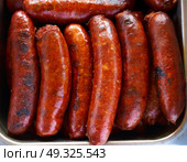 Chorizo sausage barbecue cooked in Mexico. Стоковое фото, агентство Ingram Publishing / Фотобанк Лори