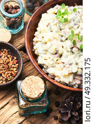 Popular Russian meat salad Olivier. Traditional Russian meat salad Olivier, with meat and vegetables. Стоковое фото, агентство Ingram Publishing / Фотобанк Лори