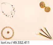 Fashionable Women’s Cosmetics and Accessories. Falt Lay. Stylish Sunglass. Make-Up Brushes. Gold Necklace. Women Accessories. Стоковое фото, агентство Ingram Publishing / Фотобанк Лори