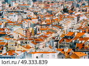 Aerial View Of Lisbon City Home Rooftops In Portugal. Стоковое фото, агентство Ingram Publishing / Фотобанк Лори