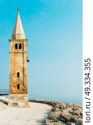 Church of Our Lady of the Angel on the beach of Caorle Italy, Santuario della Madonna dell’Angelo. Стоковое фото, агентство Ingram Publishing / Фотобанк Лори