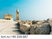 Church of Our Lady of the Angel on the beach of Caorle Italy, Santuario della Madonna dell’Angelo. Стоковое фото, агентство Ingram Publishing / Фотобанк Лори