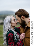 pair of lovers in the Carpathian mountains in national costumes. Стоковое фото, агентство Ingram Publishing / Фотобанк Лори