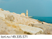 Church of Our Lady of the Angel on the beach of Caorle Italy, Santuario della Madonna dell’Angelo. Стоковое фото, агентство Ingram Publishing / Фотобанк Лори