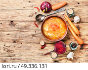 Ukrainian national borshch. Food of national Ukrainian cuisine. Borscht with meat and vegetables.Copy space. Стоковое фото, агентство Ingram Publishing / Фотобанк Лори