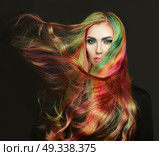 Portrait of young beautiful woman with long flowing hair. Model with perfect Healthy Dyed Hair. Rainbow Hairstyles. Стоковое фото, агентство Ingram Publishing / Фотобанк Лори