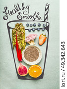Painted glass with smoothie or detox drink ingredients: Chia seeds, orange, pink broccoli,strawberries, blueberries and red chard or kale leaves, top view. Стоковое фото, агентство Ingram Publishing / Фотобанк Лори