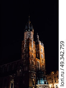 Night old commercial area of Krakow in the lights of street lamps. Old Europe. Стоковое фото, агентство Ingram Publishing / Фотобанк Лори