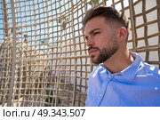 young beard man relaxed in a beach hammock. Стоковое фото, агентство Ingram Publishing / Фотобанк Лори