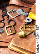 Tools for leather craft. Working tools and cut out pieces of leather. Стоковое фото, агентство Ingram Publishing / Фотобанк Лори