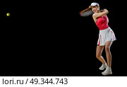 Young woman tennis player (with ball version) Стоковое фото, агентство Ingram Publishing / Фотобанк Лори