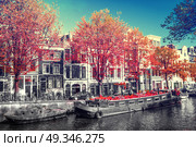 Amsterdam. black and white photo with elements of red. Стоковое фото, агентство Ingram Publishing / Фотобанк Лори