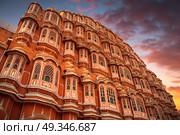 Hawa Mahal - a five-tier harem wing of the palace complex of the Maharaja of Jaipur, built of pink sandstone in the form of the crown of Krishna. Стоковое фото, агентство Ingram Publishing / Фотобанк Лори