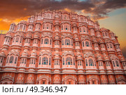 Hawa Mahal - a five-tier harem wing of the palace complex of the Maharaja of Jaipur, built of pink sandstone in the form of the crown of Krishna. Стоковое фото, агентство Ingram Publishing / Фотобанк Лори