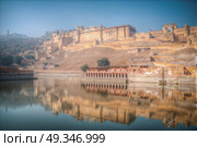 Amber Fort or Amer - fortified residence of Raja in the eponymous northern suburbs of Jaipur, on the crest of a rocky hill behind the lake Maota. Стоковое фото, агентство Ingram Publishing / Фотобанк Лори